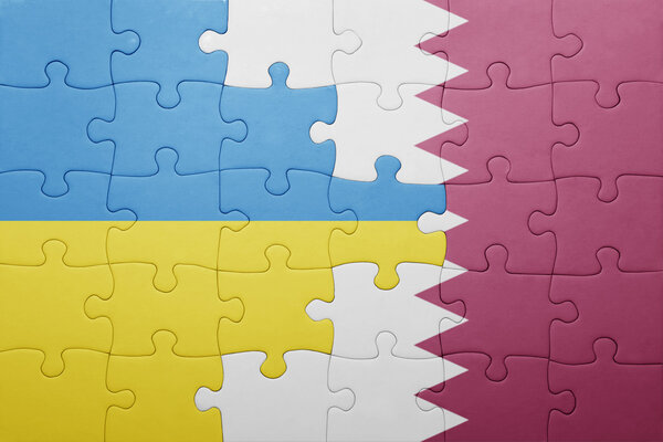 puzzle with the national flag of ukraine and qatar