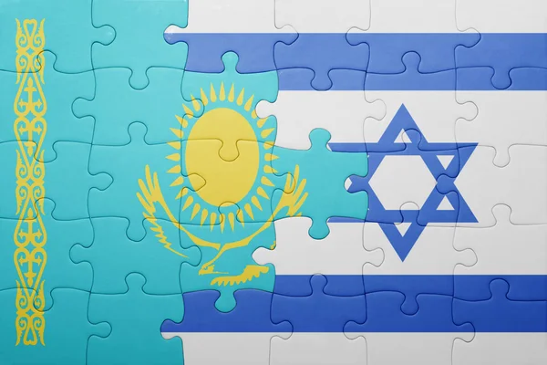 Puzzle com a bandeira nacional de Israel e do Cazaquistão — Fotografia de Stock