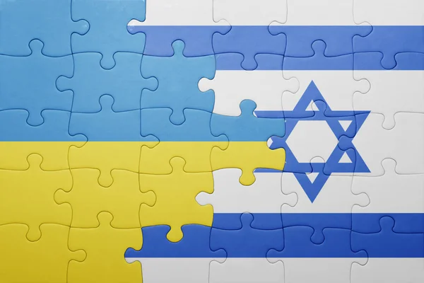 Puzzel met de nationale vlag van Israël en Oekraïne — Stockfoto