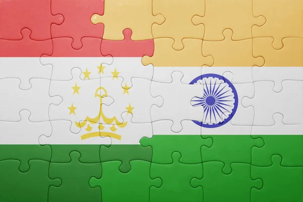 Puzzle con la bandiera nazionale del tajikistan e dell'India — Foto Stock