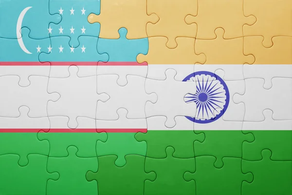 Puzzle with the national flag of uzbekistan and india — Stock Photo, Image