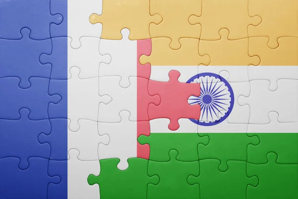 Puzzle with the national flag of france and india — Stock Photo, Image