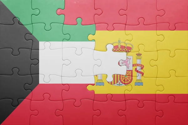 Puzzle with the national flag of spain and kuwait — Stock Photo, Image