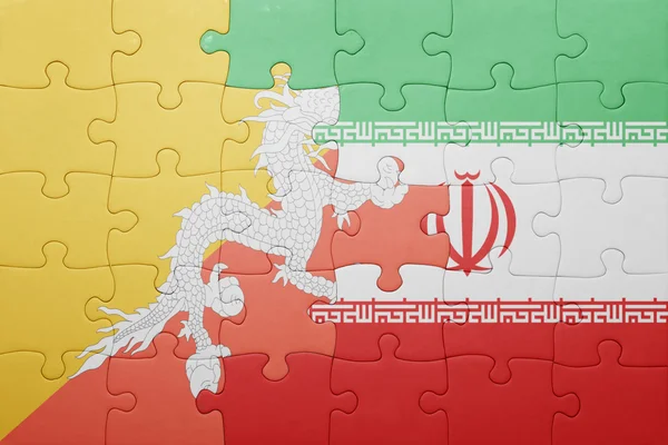 Pussel med den nationella flaggan av bhutan och iran — Stockfoto