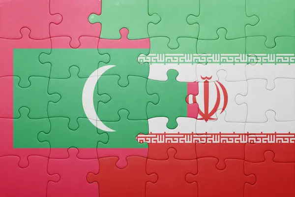 Rompecabezas con la bandera nacional de las Maldivas y el Irán —  Fotos de Stock