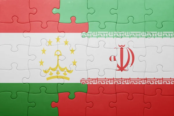 Rompecabezas con la bandera nacional de Tayikistán e Irán —  Fotos de Stock