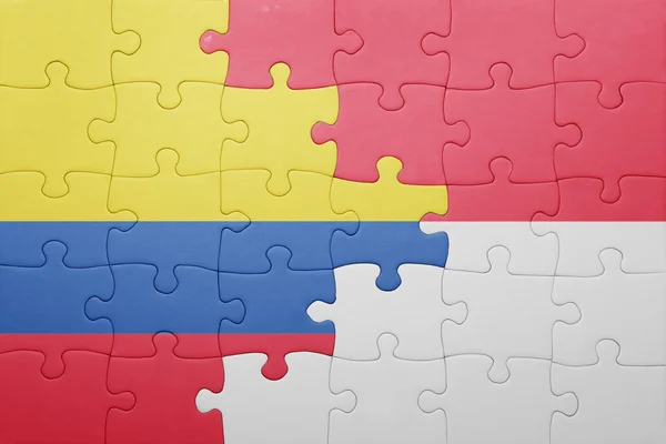 Puzzel met de nationale vlag van Indonesië en colombia — Stockfoto