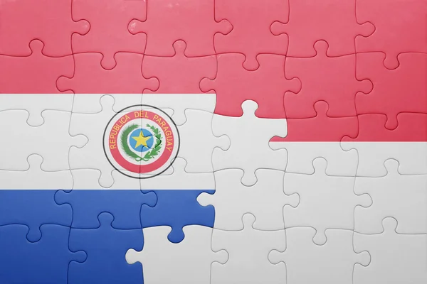 Puzzle z flagi narodowej z Indonezji i Paragwaju — Zdjęcie stockowe