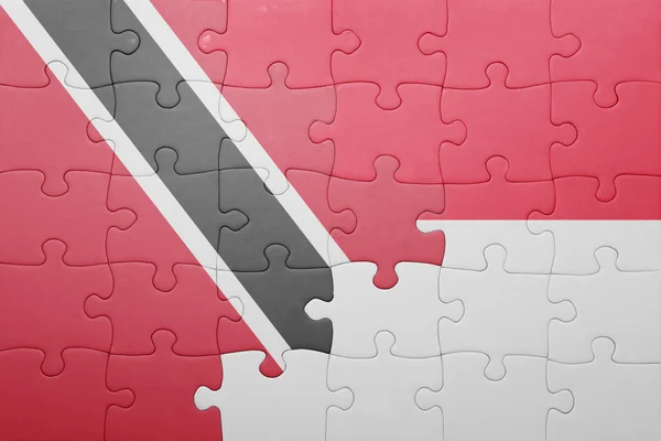 Puzzle s národní vlajka Indonésie a trinidad a tobago — Stock fotografie