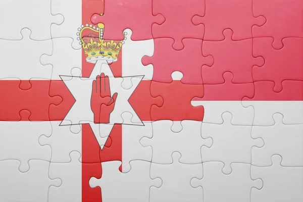 Puzzle with the national flag of indonesia and northern ireland — Stock Photo, Image