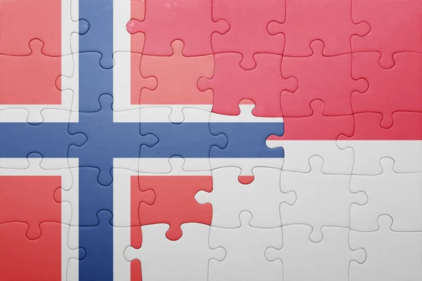 Puzzle mit der Nationalflagge Indonesiens und Norwegens — Stockfoto