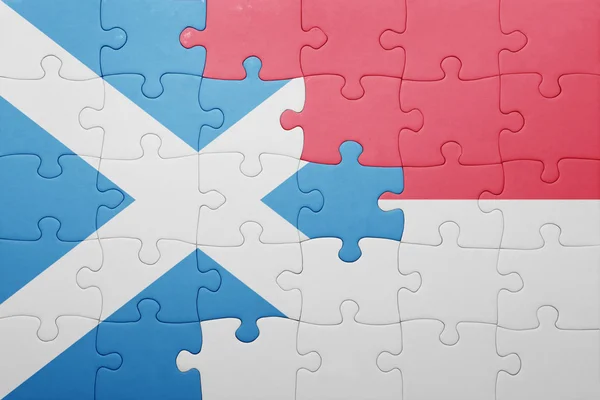 Puzzle avec le drapeau national de l'indonésie et de l'Écosse — Photo