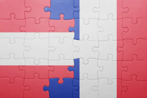 Puzzle s národní vlajkou Rakouska a Francie — Stock fotografie