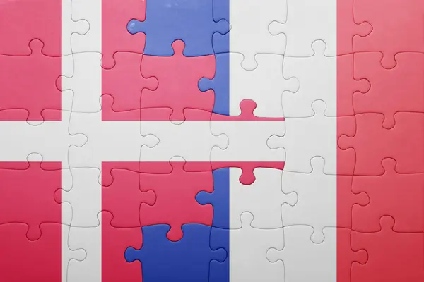 Puzzle s národní vlajkou Dánska a Francie — Stock fotografie