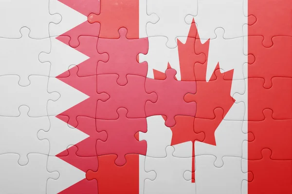 Pussel med nationella flagga Kanada och bahrain — Stockfoto