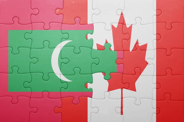 Puzzle with the national flag of canada and maldives — Stock Photo, Image