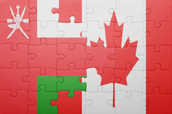 Puzzle con la bandiera nazionale del Canada e oman — Foto Stock