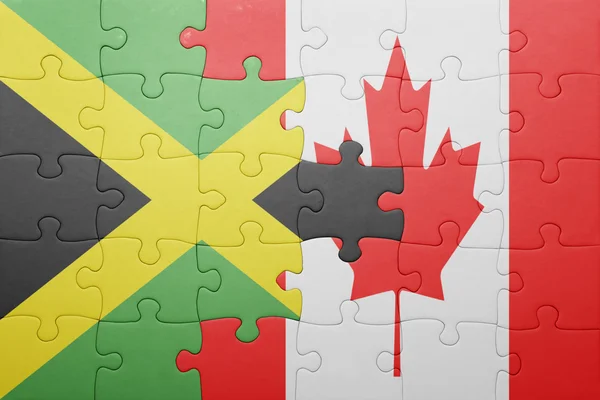 Puzzle avec le drapeau national du Canada et de la Jamaïque — Photo