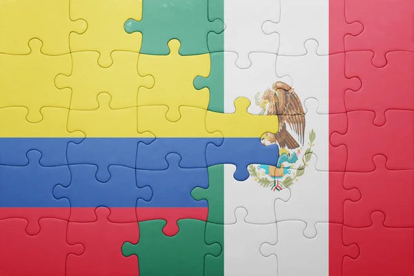 Rompecabezas con la bandera nacional de Colombia y México — Foto de Stock