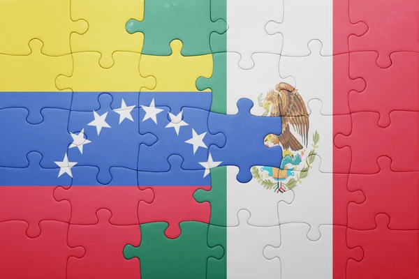 Rompecabezas con la bandera nacional de venezuela y México —  Fotos de Stock