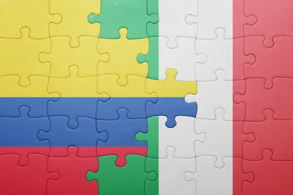 Puzzle mit der Nationalflagge Italiens und Kolumbiens — Stockfoto