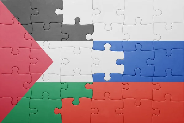 Головоломка з національним прапором Палестину та Росії — стокове фото