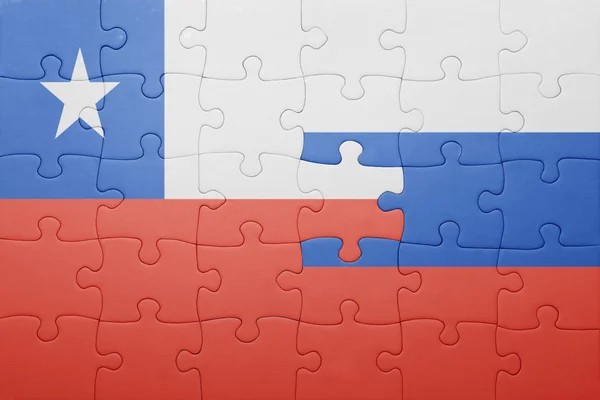 Puzzle z flagi narodowej z chile i Rosji — Zdjęcie stockowe