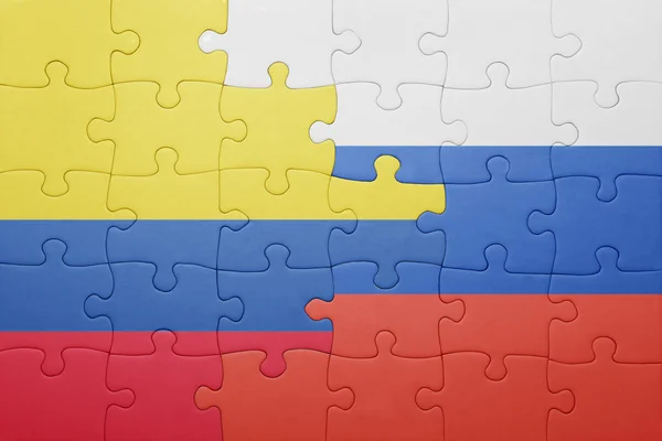 Puzzel met de nationale vlag van colombia en Rusland — Stockfoto