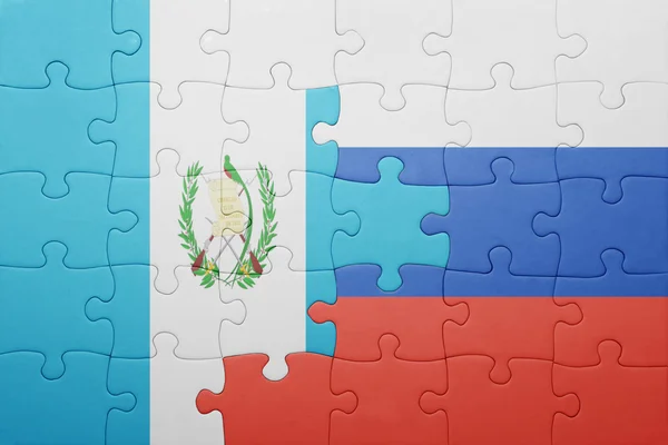 A nemzeti zászló, guatemala és Oroszország puzzle — Stock Fotó