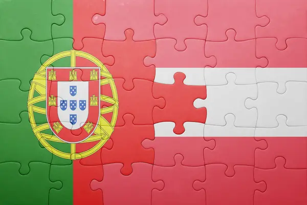Puzzle z flagi narodowej Portugalii i Austrii — Zdjęcie stockowe