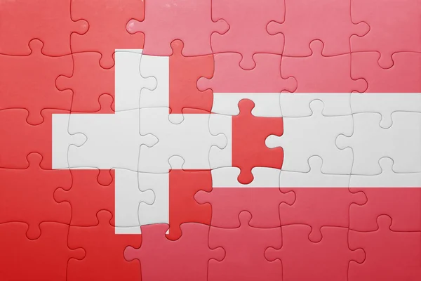 Puzzle s národní vlajka Švýcarska a Rakouska — Stock fotografie