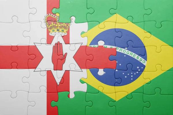 Puzzle with the national flag of northern ireland and brazil — Stock Photo, Image