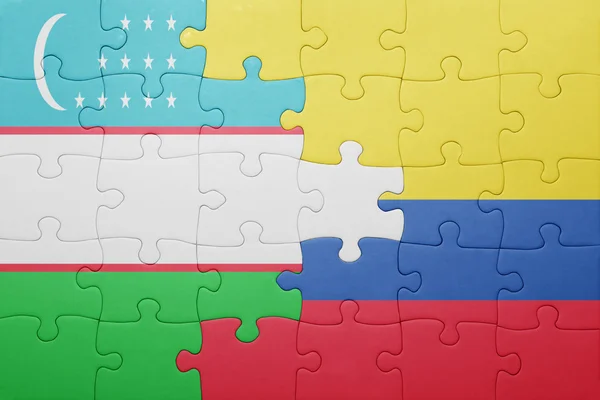 Puzzle z flagi narodowej Kolumbii i uzbekistan — Zdjęcie stockowe