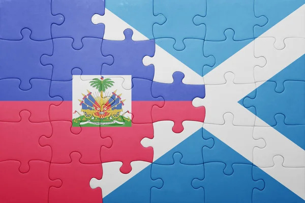 Rompecabezas con la bandera nacional de Haití y Escocia — Foto de Stock