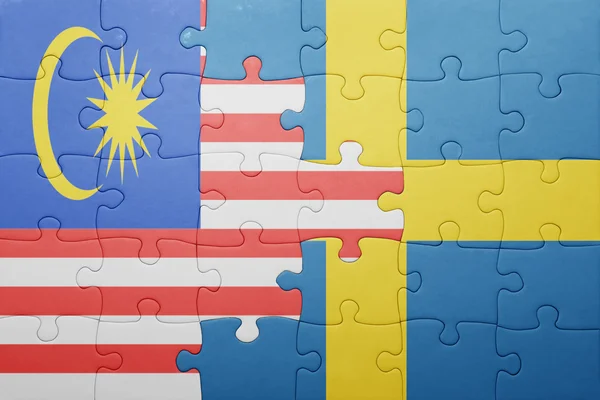 Puzzle with the national flag of sweden and malaysia — Stock Photo, Image