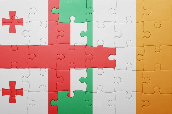 Puzzle with the national flag of ireland and georgia — Stock Photo, Image
