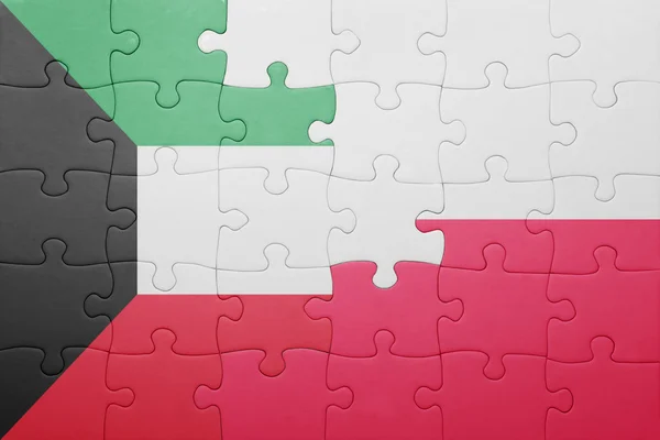 Puzzle with the national flag of kuwait and poland — Stock Photo, Image