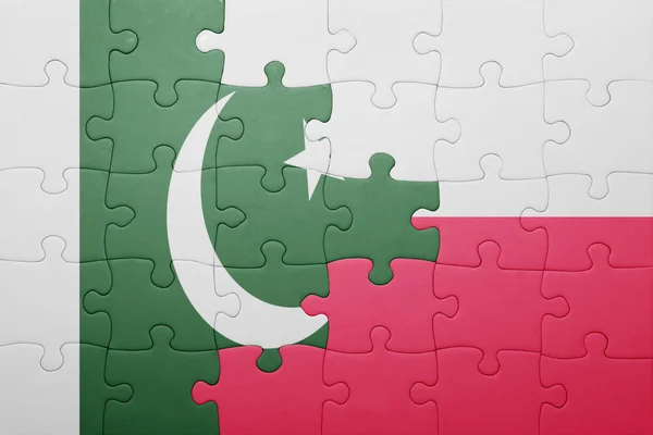 パキスタンとポーランドの国旗をパズルします。 — ストック写真