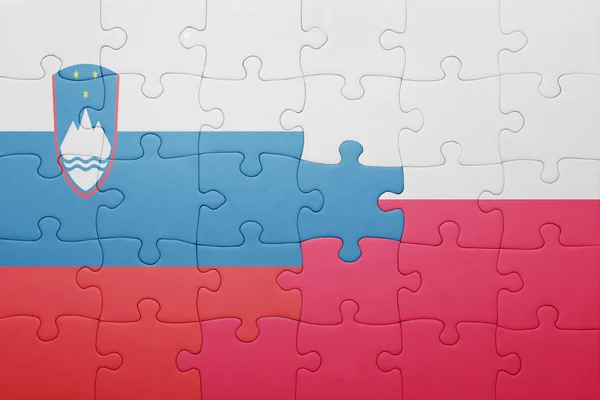 Puzzle con la bandiera nazionale di Slovenia e Polonia — Foto Stock