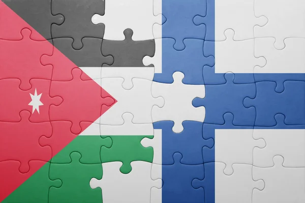 Puzzle with the national flag of jordan and finland — Stock Photo, Image