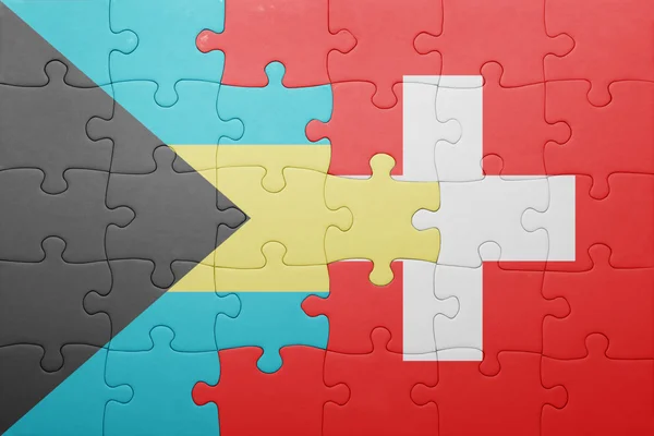 Головоломка з Національний прапор Швейцарії і Багамських островів — стокове фото