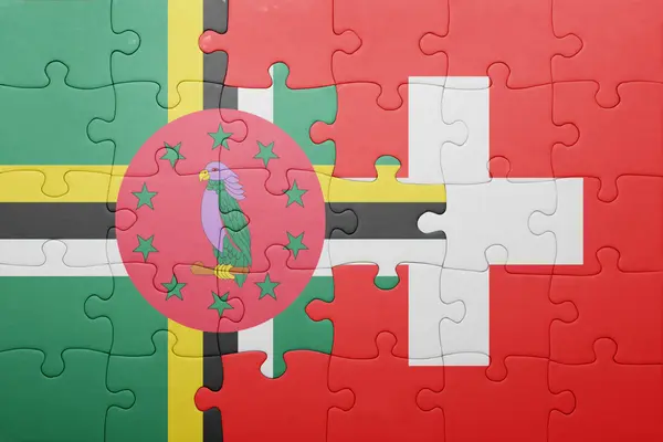 Puzzle s národní vlajka Švýcarska a Dominika — Stock fotografie