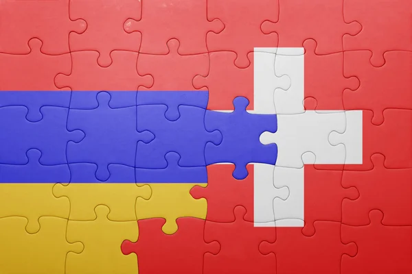 Puzzle avec le drapeau national de la Suisse et l'arménie — Photo