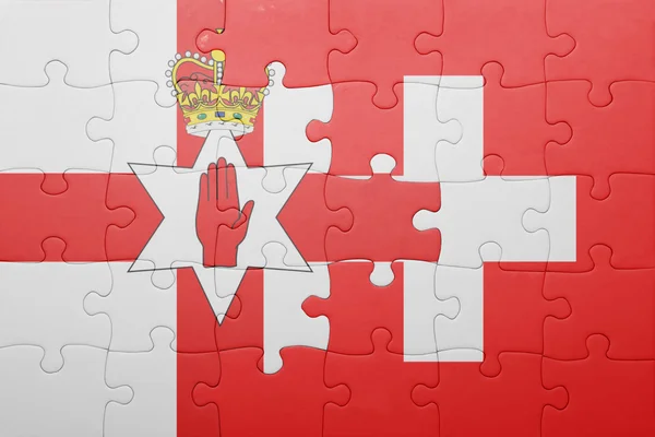 Puzzle with the national flag of switzerland and northern ireland — Stock Photo, Image