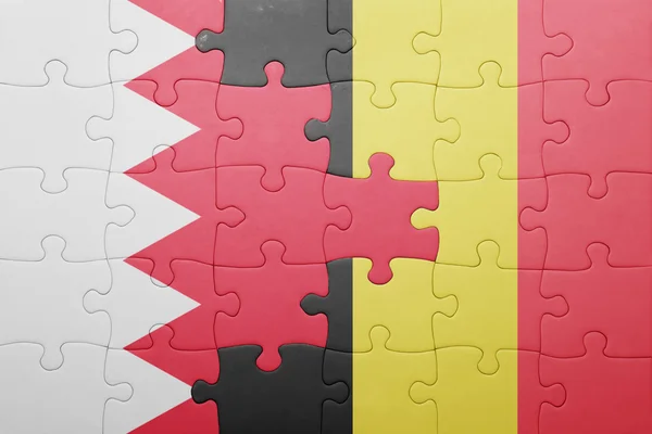 Quebra-cabeça com a bandeira nacional do Bahrein e da Bélgica — Fotografia de Stock