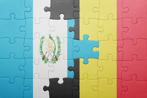 Rompecabezas con la bandera nacional de guatemala y belgium — Foto de Stock
