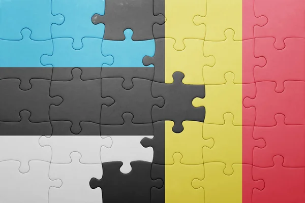 Puzzle with the national flag of estonia and belgium — Stock Photo, Image