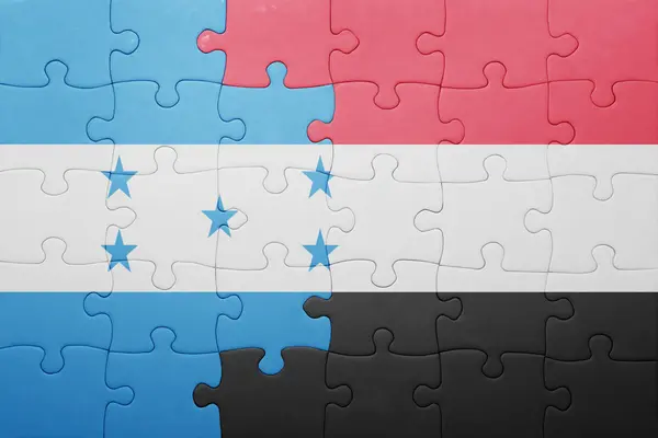 Puzzle s státní vlajky honduras a Jemenu — Stock fotografie