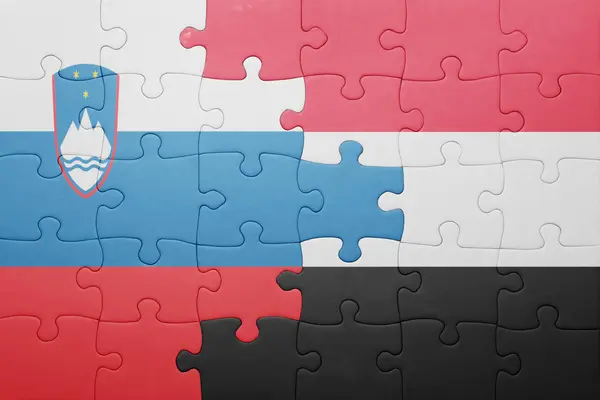 Puzzle with the national flag of slovenia and yemen — Stock Photo, Image