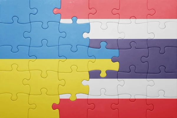 Puzzle mit der ukrainischen und thailändischen Nationalflagge — Stockfoto